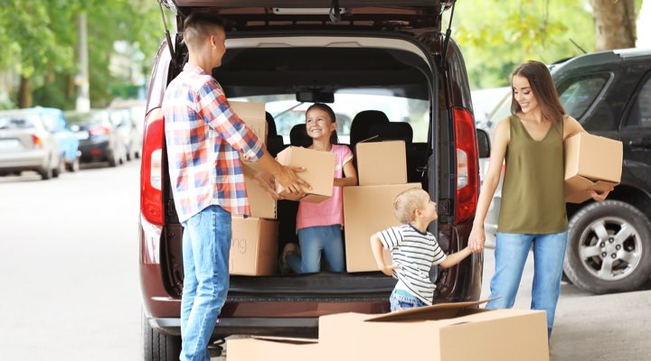 Photo of family loading car